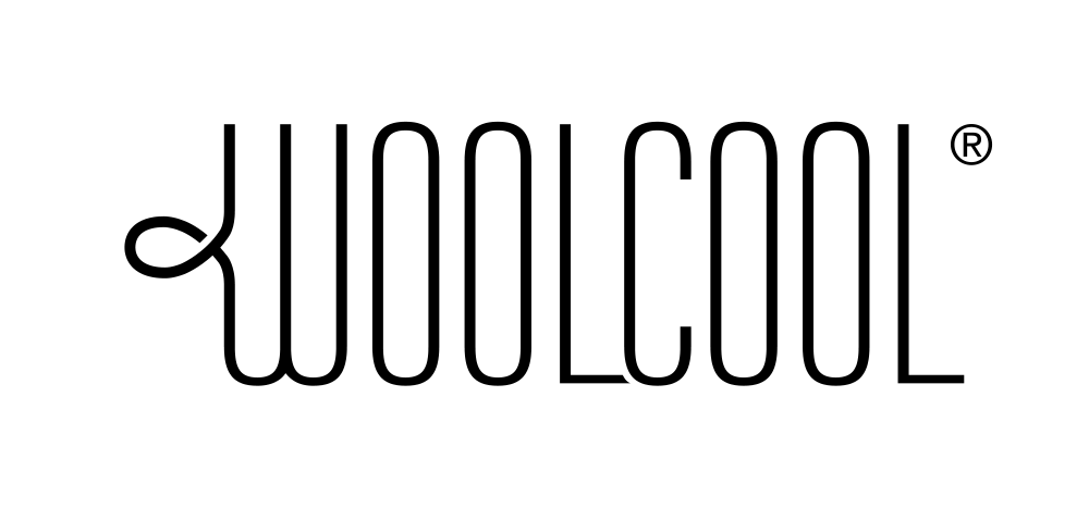 Woolcool logo, consisitng of the word Woolcool in a stylised font. The W has a loop on its left side representing the helix of a wool fibre at microscopic level. Black.