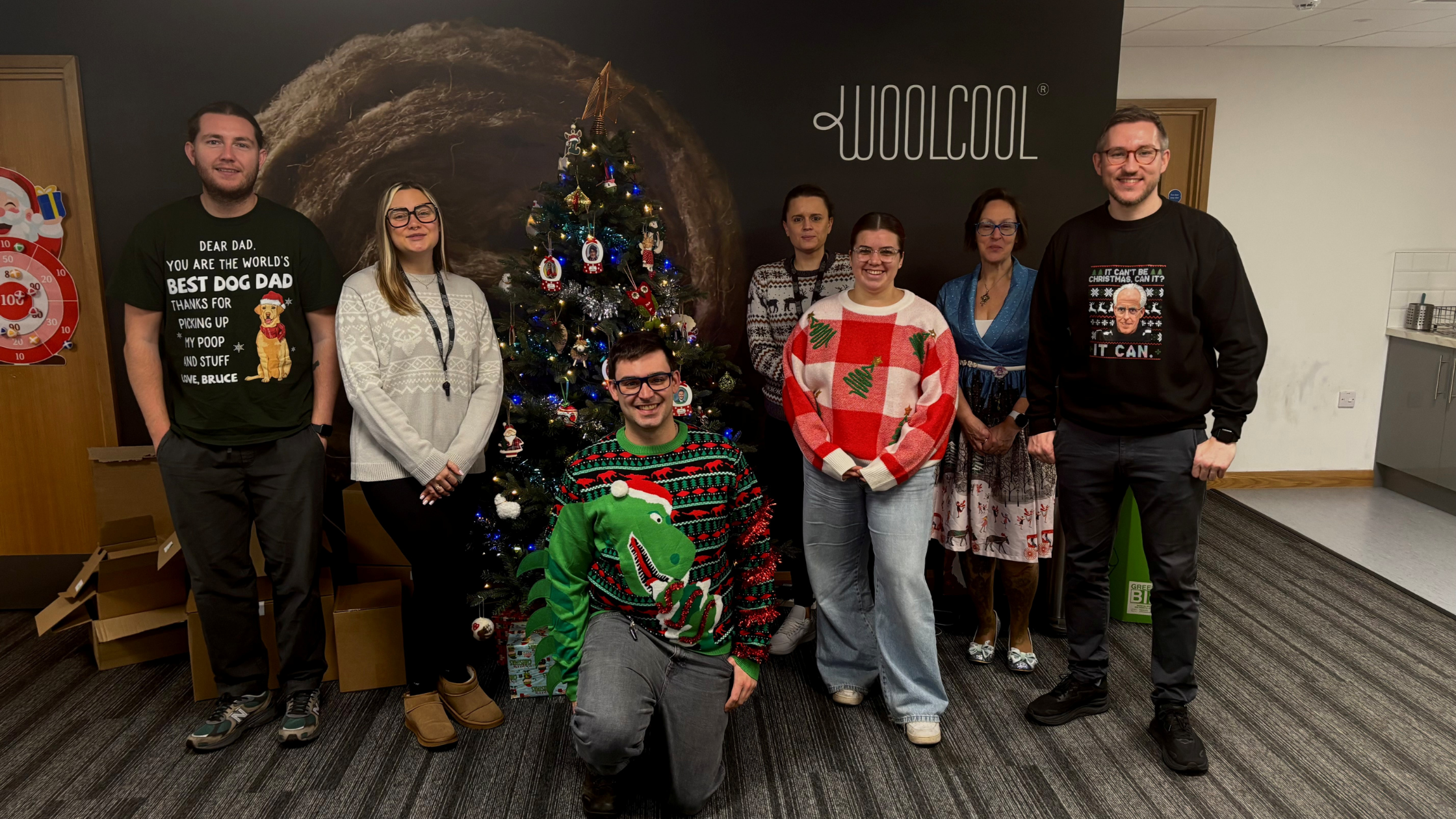 The Woolcool office team wearing Christmas jumpers