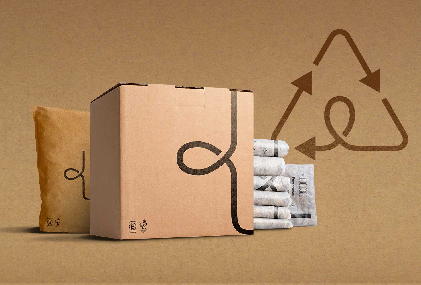 A box, placed in front of a stack of Woolcool insualtion Liners, featuring the W from the Woolcool Logo