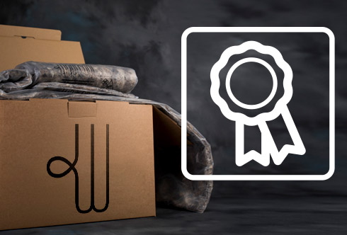 A Woolcool box with some wool liners and a rosette icon