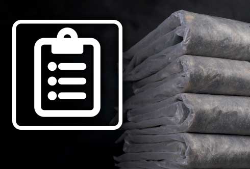 A stack of wool liners with a tick list icon